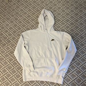 white nike hoodie with brown logo
